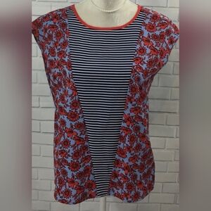 Dalia brand blouse featuring a mixed print of red floral patterns on a blue back